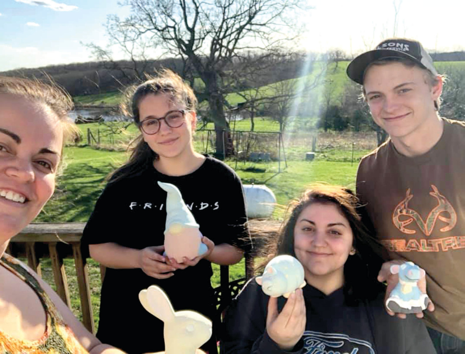 Frances Boswell, Arianna Cingolani, Abigail Boswell and Ryan Vandergrift recently had a ceramic-painting party.