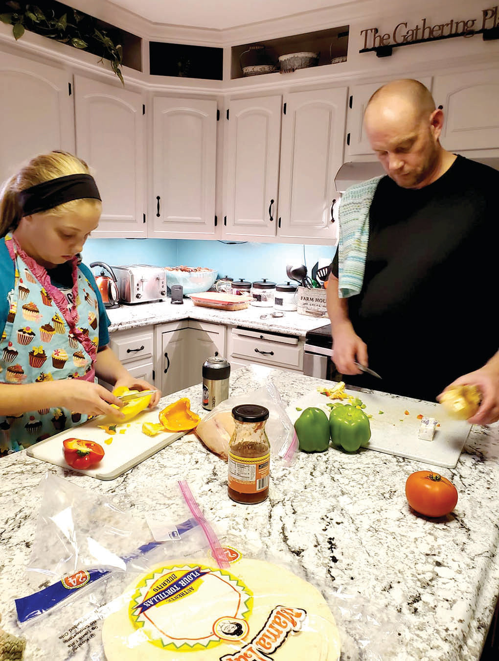 Ava Buhr and her dad, Brad, enjoy spending time together cooking.