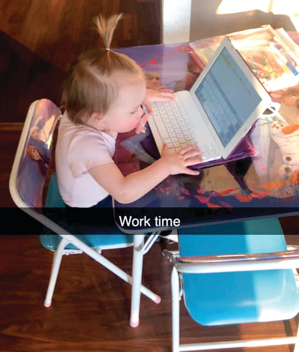 Trudy and Ryan Parkhurst set their daughter, Ryder, up with her own desk so she can “work” while mommy does.