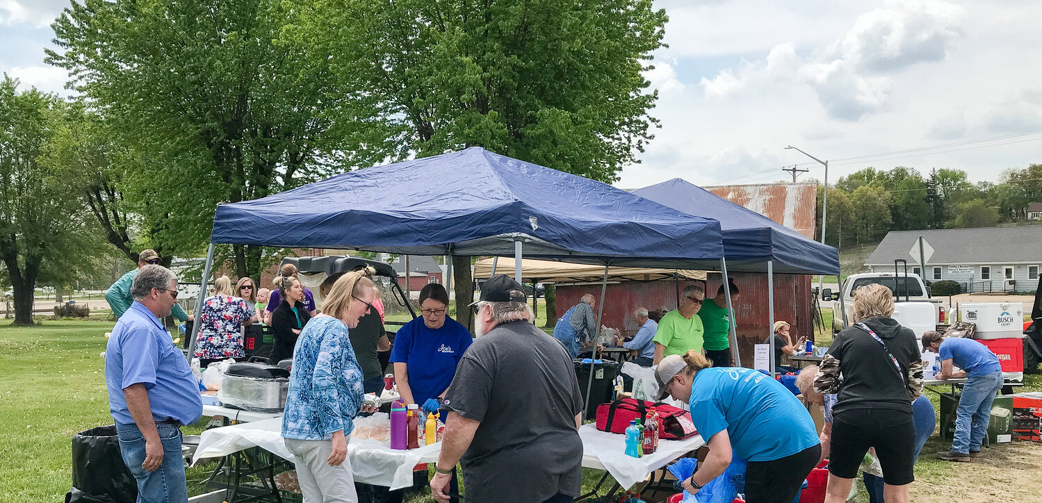 A steady line of patrons and well-wishers were treated to a pork burger or brat, chips, dessert, and a drink at Friday’s 20th-anniversary celebration at Joe’s Market in Westphalia. There was also an opportunity to purchase Joe’s Market t-shirts and chances to enter drawings for prizes.